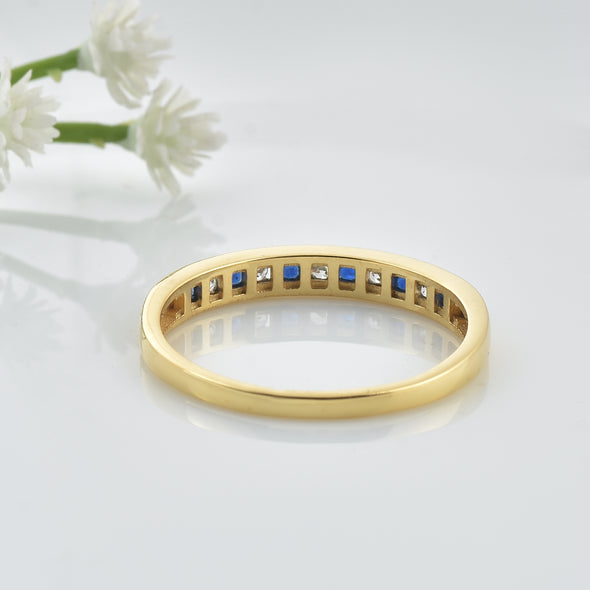0.03 Ct Round Blue Sapphire Eternity Band Ring 925 Sterling Silver Yellow Plated