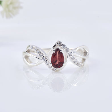0.70 Ct Pear Shape Rhodonite Garnet Infinity Twist Ring 925 Sterling Silver