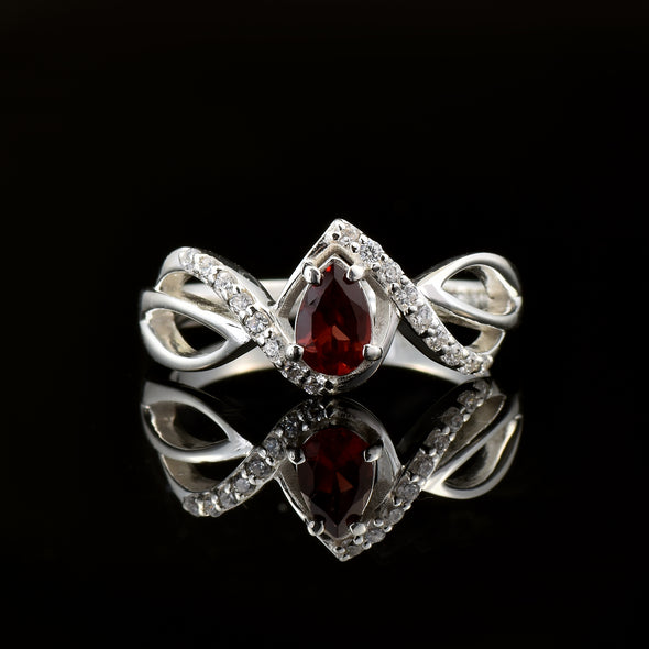 0.70 Ct Pear Shape Rhodonite Garnet Infinity Twist Ring 925 Sterling Silver