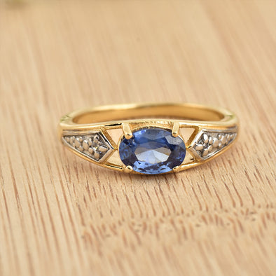 925 Sterling Silver 7x5MM Oval Tanzanite Ring with White Topaz Accents Ring