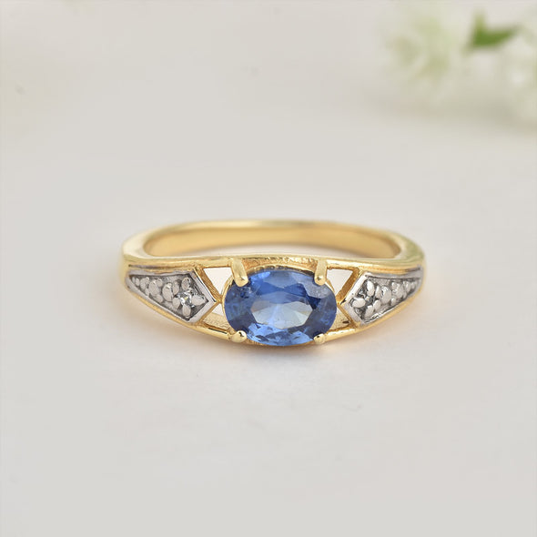 925 Sterling Silver 7x5MM Oval Tanzanite Ring with White Topaz Accents Ring