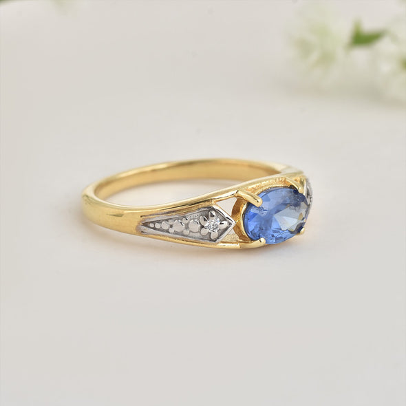 925 Sterling Silver 7x5MM Oval Tanzanite Ring with White Topaz Accents Ring