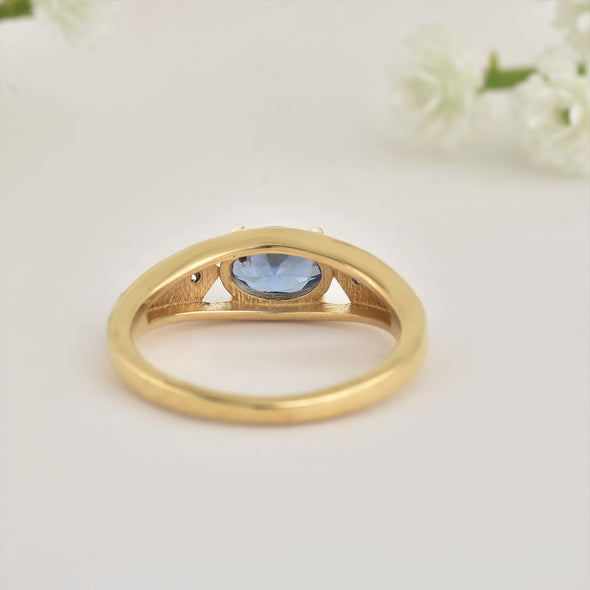 925 Sterling Silver 7x5MM Oval Tanzanite Ring with White Topaz Accents Ring