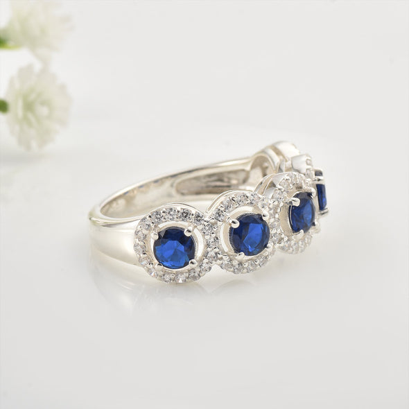 925 Sterling Silver 4x4MM Round Blue Sapphire Halo Band with CZ Accents Ring