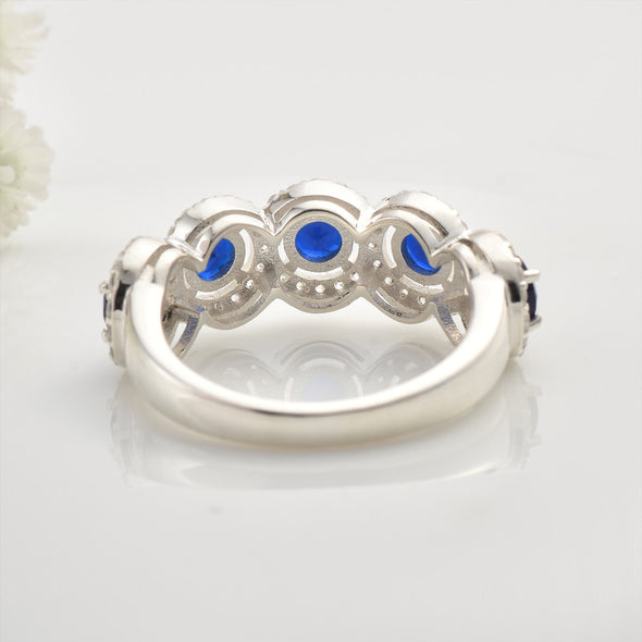 925 Sterling Silver 4x4MM Round Blue Sapphire Halo Band with CZ Accents Ring