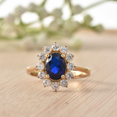925 Sterling Silver 8x6MM Oval Blue Sapphire Halo with CZ Accents Ring