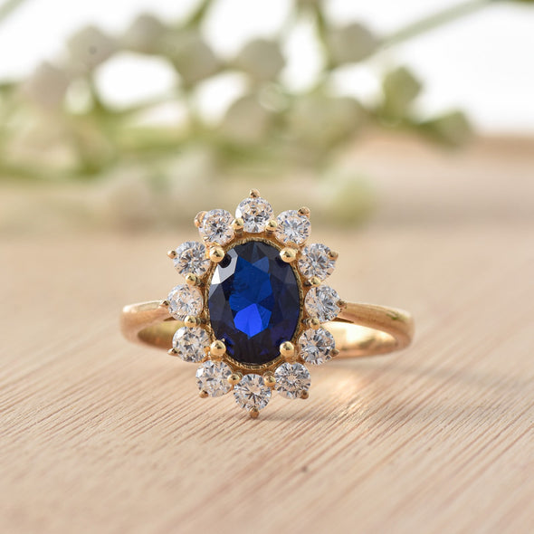 925 Sterling Silver 8x6MM Oval Blue Sapphire Halo with CZ Accents Ring