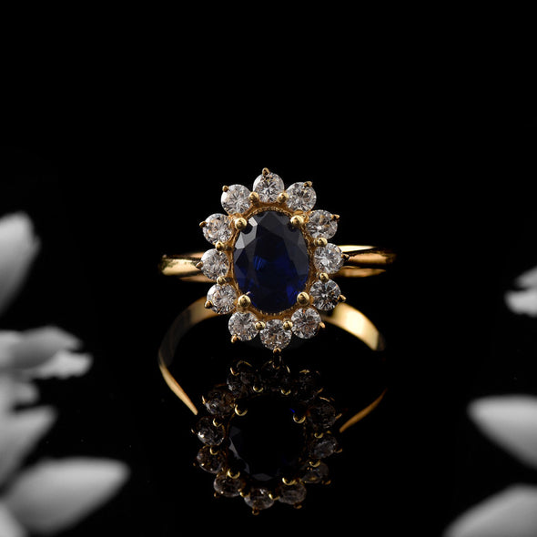 925 Sterling Silver 8x6MM Oval Blue Sapphire Halo with CZ Accents Ring