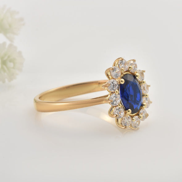 925 Sterling Silver 8x6MM Oval Blue Sapphire Halo with CZ Accents Ring