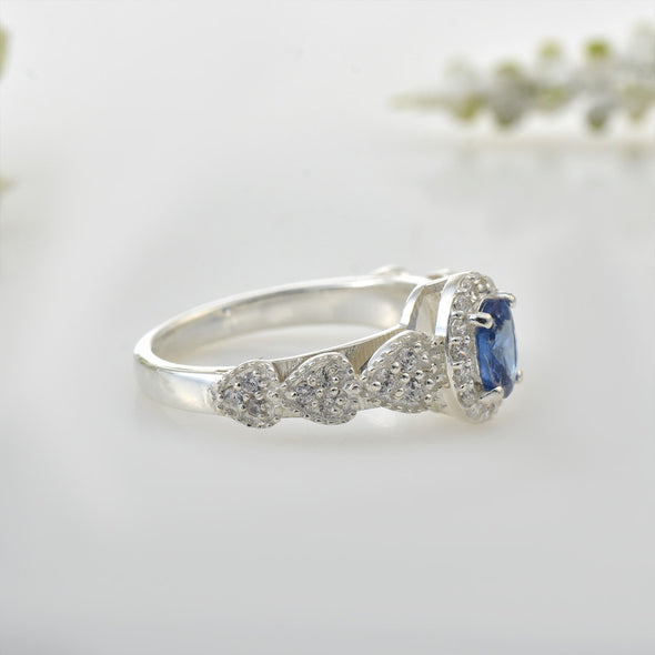 6x4mm Oval Tanzanite Halo Ring with CZ Accents 925 Sterling Silver Ring
