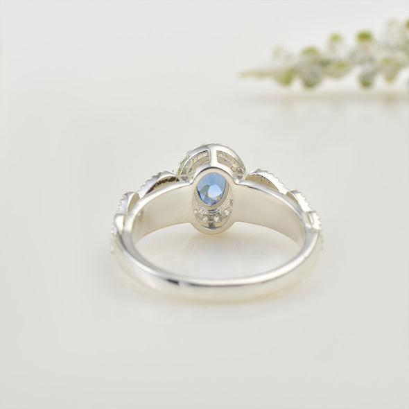 6x4mm Oval Tanzanite Halo Ring with CZ Accents 925 Sterling Silver Ring