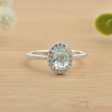 7x5mm Oval Aquamarine Halo Ring with CZ Accents 925 Sterling Silver