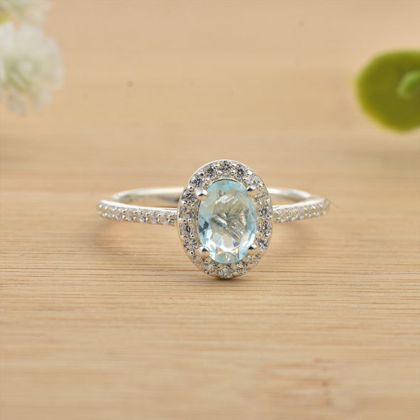 7x5mm Oval Aquamarine Halo Ring with CZ Accents 925 Sterling Silver