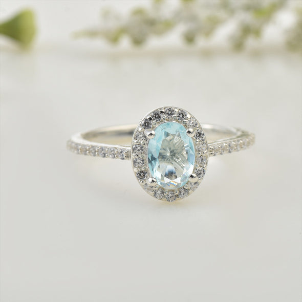 7x5mm Oval Aquamarine Halo Ring with CZ Accents 925 Sterling Silver