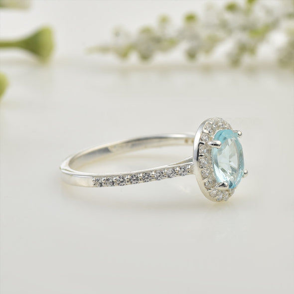 7x5mm Oval Aquamarine Halo Ring with CZ Accents 925 Sterling Silver
