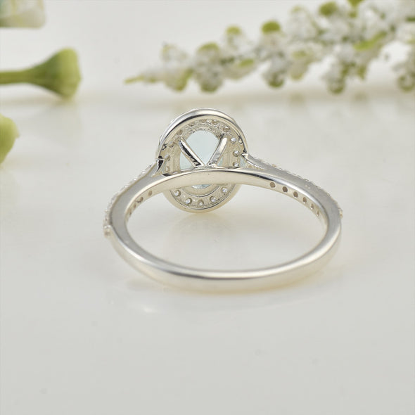 7x5mm Oval Aquamarine Halo Ring with CZ Accents 925 Sterling Silver