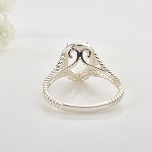 925 Sterling Silver 9x7mm Oval Moonstone Halo Ring