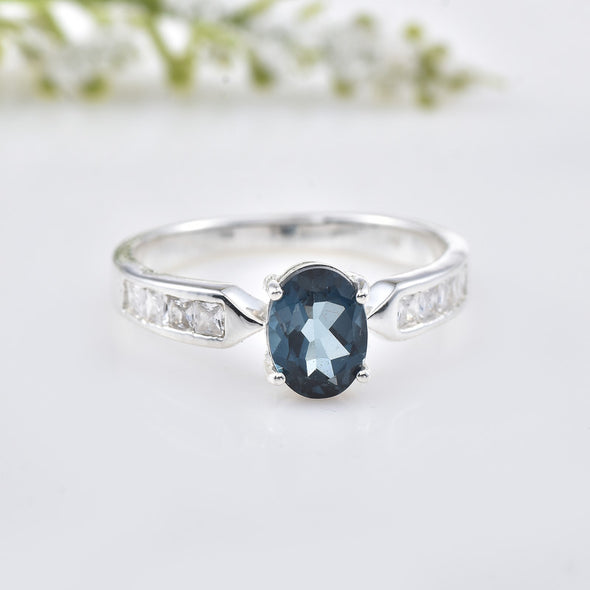 6x4mm Oval London Blue Topaz with CZ Accents Ring 925 Sterling Silver