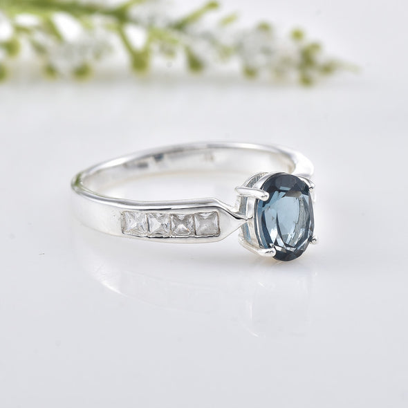 6x4mm Oval London Blue Topaz with CZ Accents Ring 925 Sterling Silver