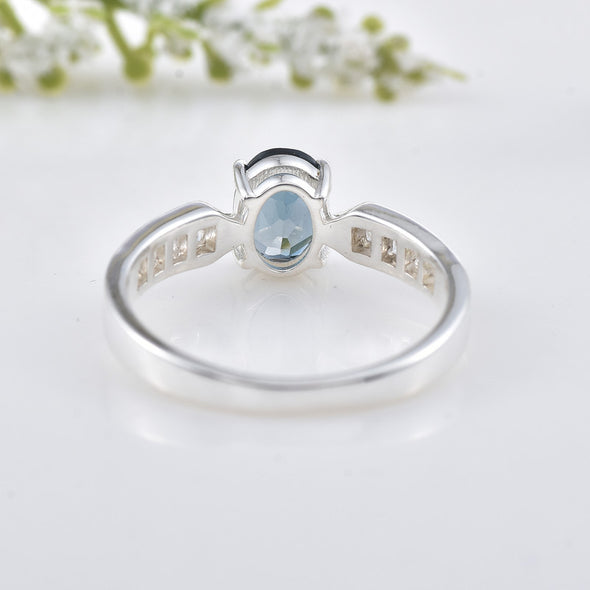 6x4mm Oval London Blue Topaz with CZ Accents Ring 925 Sterling Silver