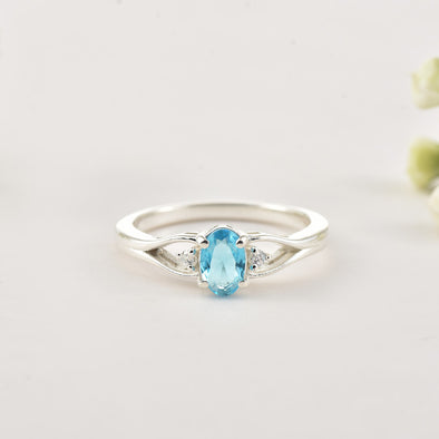 6x4mm Oval Swiss Blue Topaz Three Stone Ring 925 Sterling Silver