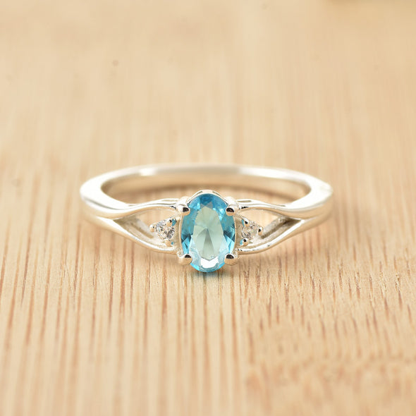 6x4mm Oval Swiss Blue Topaz Three Stone Ring 925 Sterling Silver