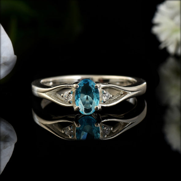 6x4mm Oval Swiss Blue Topaz Three Stone Ring 925 Sterling Silver