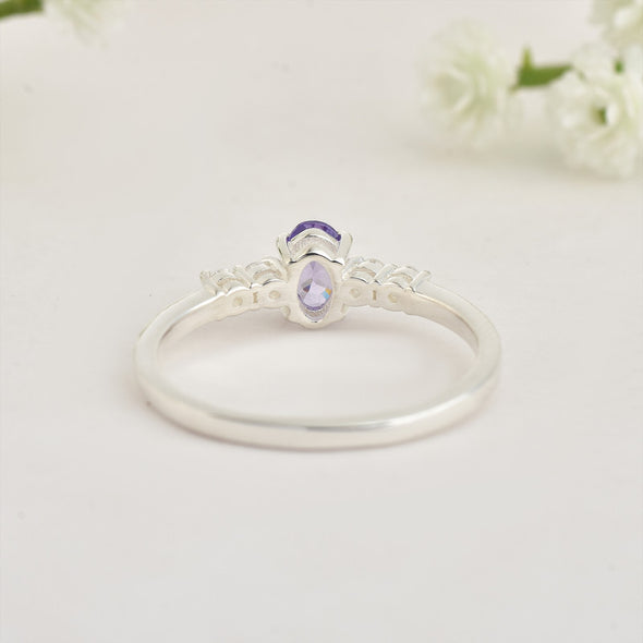 925 Sterling Silver 6x4mm Oval Tanzanite and White Stone Ring