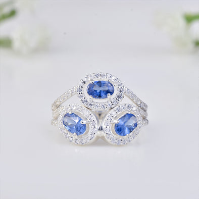 6x4mm Oval Tanzanite Triple Halo Design Ring 925 Sterling Silver