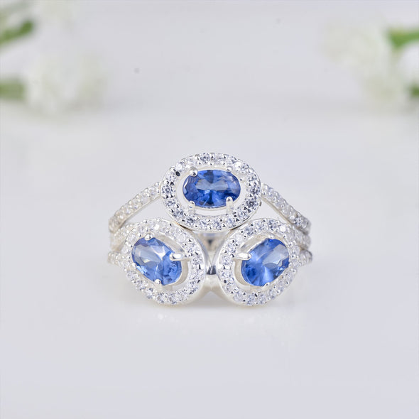 6x4mm Oval Tanzanite Triple Halo Design Ring 925 Sterling Silver