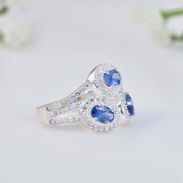 6x4mm Oval Tanzanite Triple Halo Design Ring 925 Sterling Silver