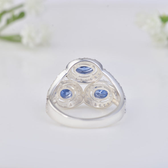 6x4mm Oval Tanzanite Triple Halo Design Ring 925 Sterling Silver
