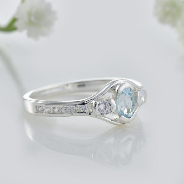 6x4mm Oval Blue Topaz Ring 925 Sterling Silver with White Accents