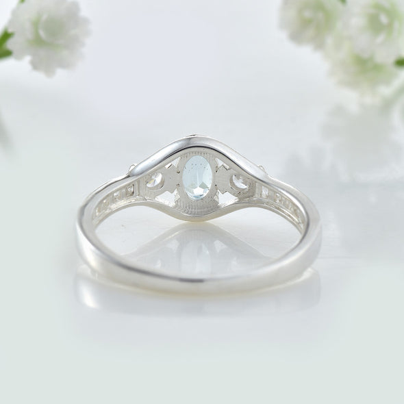 6x4mm Oval Blue Topaz Ring 925 Sterling Silver with White Accents